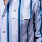 The Tristan Long Sleeve Pearl Snap Shirt in Blue